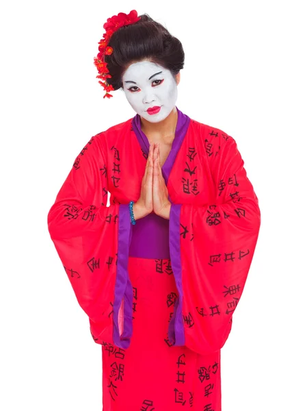 Portrait of geisha with hands together respect gesture isolated — Stock Photo, Image