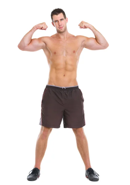 Male athlete showing muscular body — Stock Photo, Image