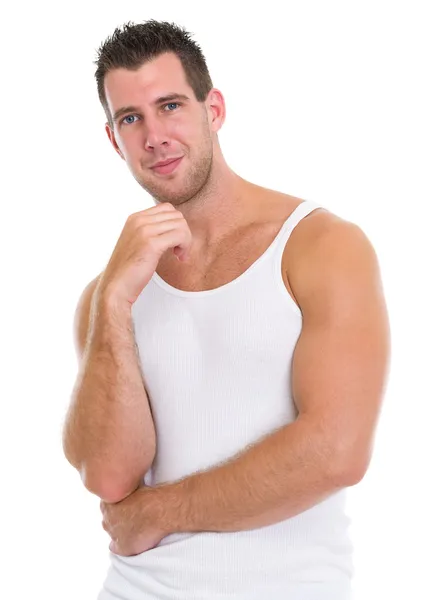 Portrait of happy muscular man in a-shirt — Stock Photo, Image