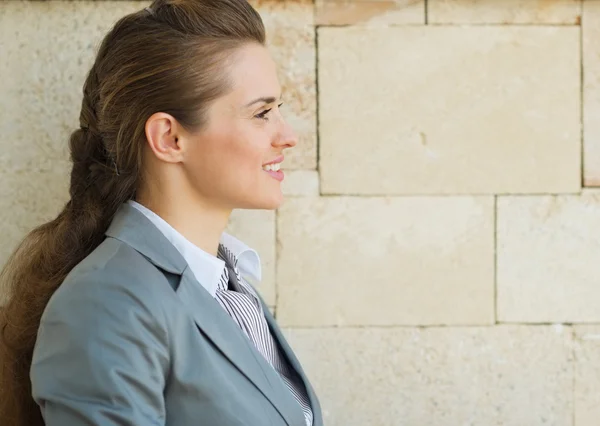 Profile portrait of happy business woman looking on copy space — Stock Photo, Image