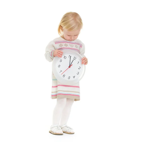 Retrato de Navidad de la niña mirando en el reloj —  Fotos de Stock