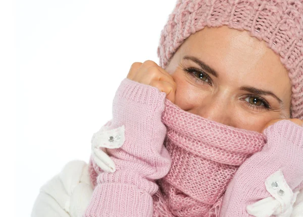 Portrait of woman in knit winter clothing closing face with scar — Stock Photo, Image