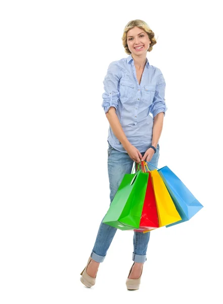 Menina adolescente feliz com sacos de compras — Fotografia de Stock