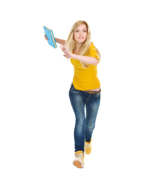 Teenage student girl with books running