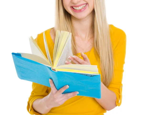 Closeup on student girl leaf through book — Stock Photo, Image