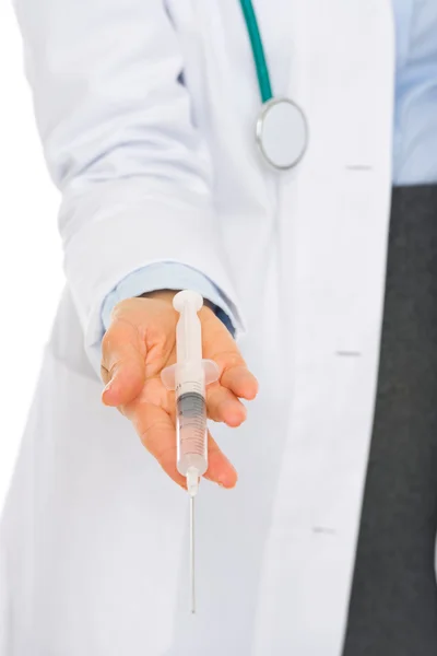 Closeup on hands of medical doctor giving syringe — Stock Photo, Image