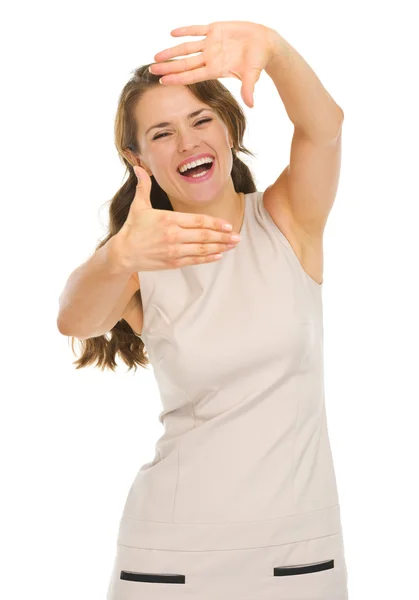 Young woman in dress framing with hands — Stock Photo, Image