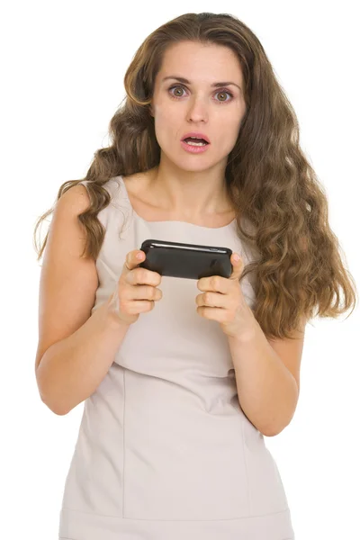 Mujer sorprendida leyendo sms —  Fotos de Stock