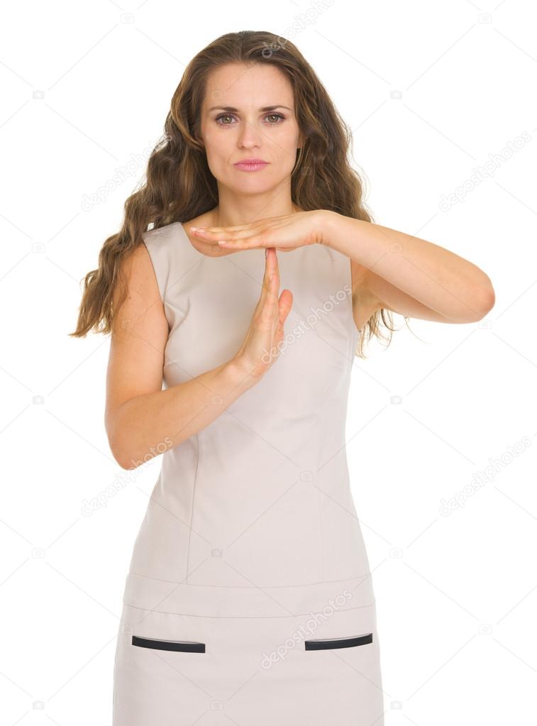 Concern young woman showing stop gesture