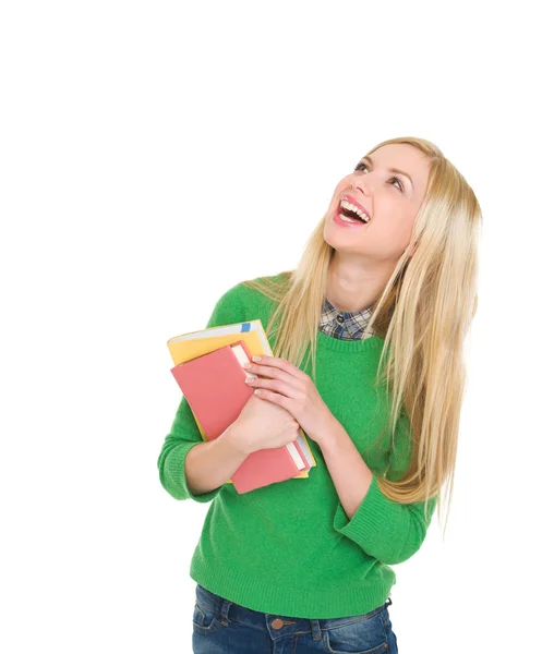 Ritratto di studentessa sorridente che alza lo sguardo sullo spazio di copia — Foto Stock