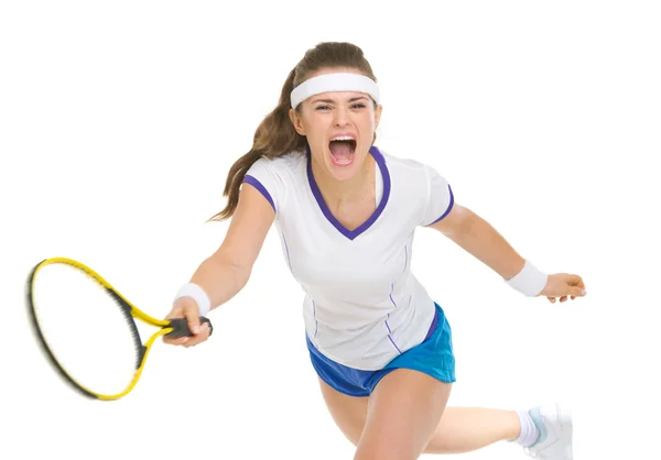 Raging tennis player hitting ball — Stock Photo, Image