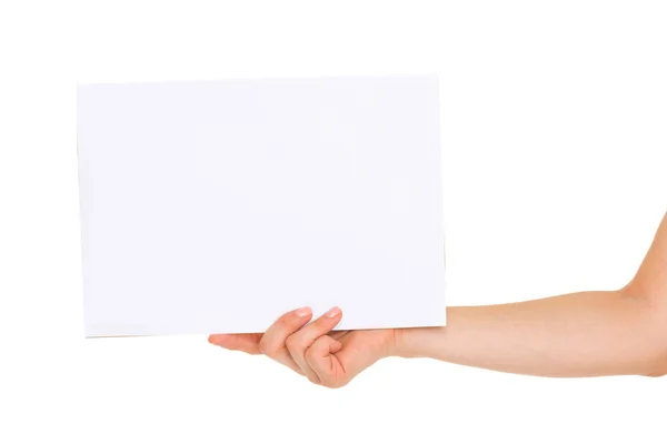 Closeup on blank paper in woman hand — Stock Photo, Image