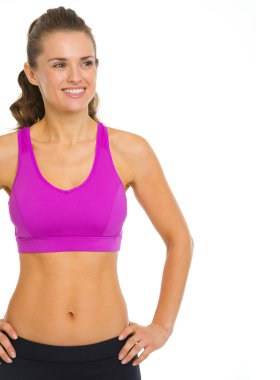 gülümseyen fitness genç kadın kopya alanı üzerinde seyir