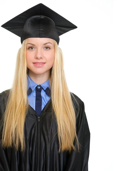Portrait of young woman in graduation gown — Stock Photo, Image