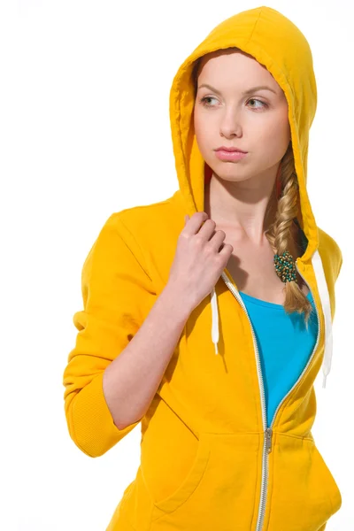 Ragazza adolescente moderna in maglione con cappuccio drappeggiato guardando sulla copia — Foto Stock