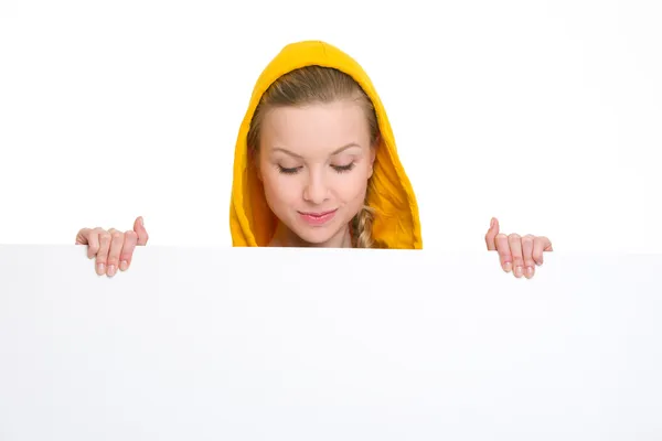 Teenager girl looking on blank billboard — Stock Photo, Image