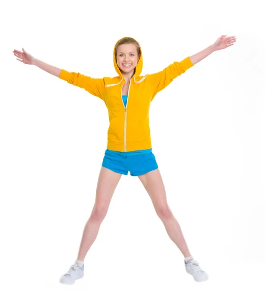 Smiling teenager girl jumping — Stock Photo, Image