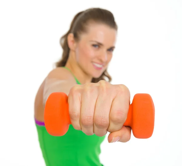 Closeup on dumbbells in hand of fitness young woman — Stock Photo, Image