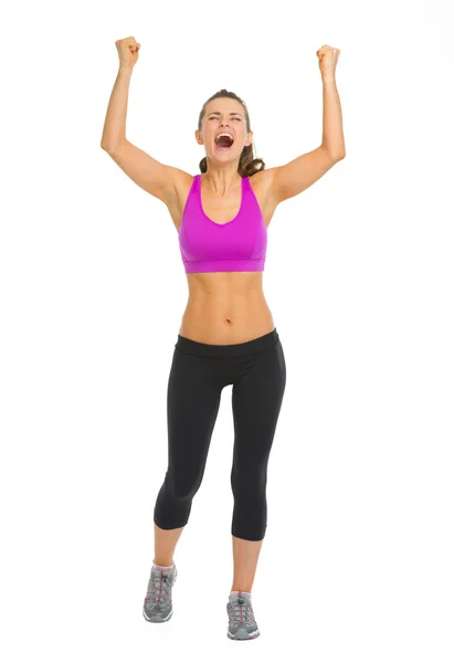 Full length portrait of fitness young woman rejoicing success — Stock Photo, Image