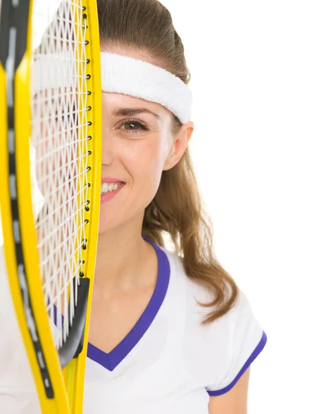 Portrait of happy female tennis player with racket Royalty Free Stock Photos