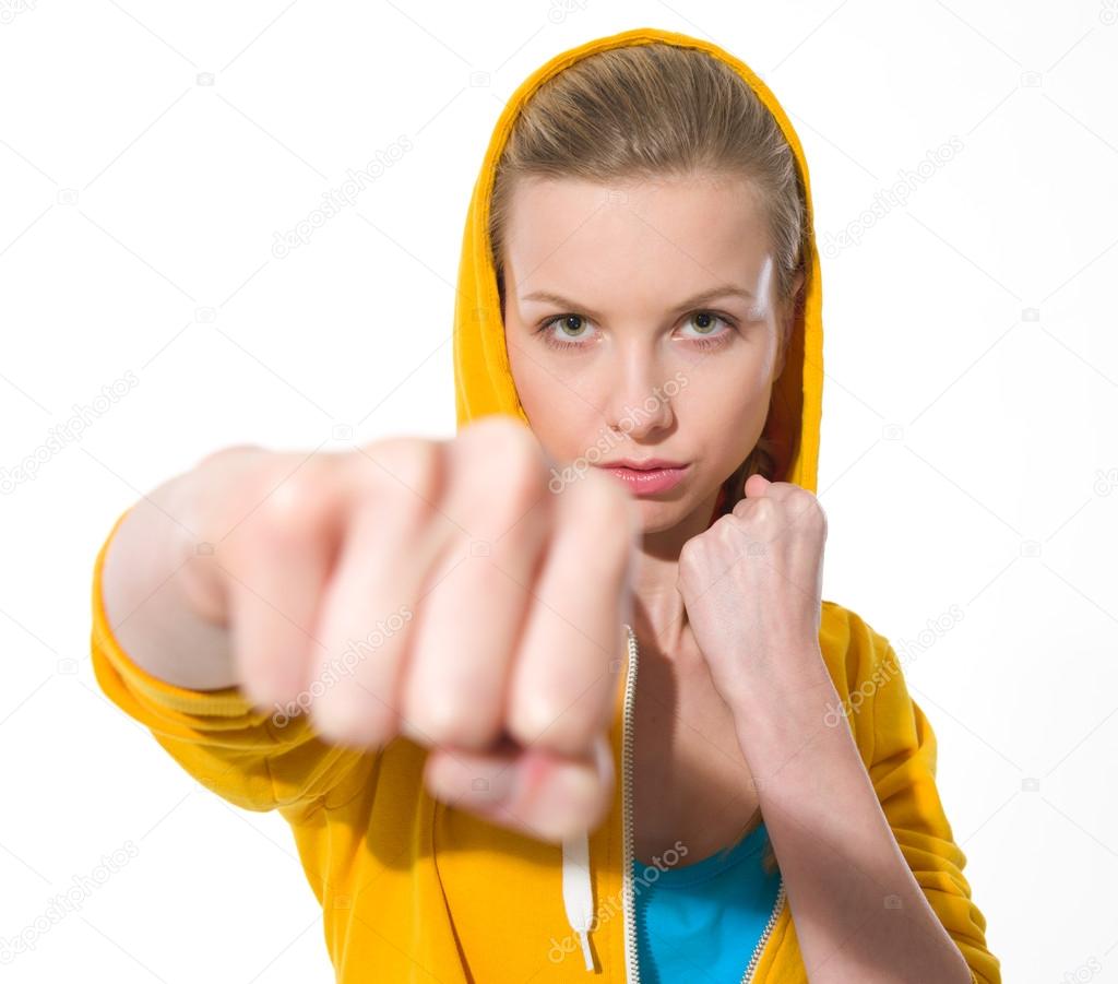 Teenager girl punching