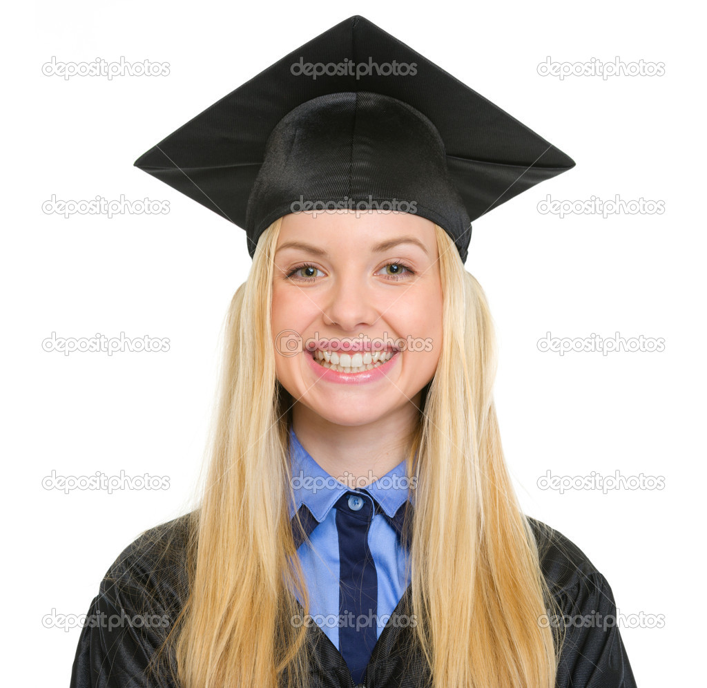 Portrait of smiling young woman in graduation gown