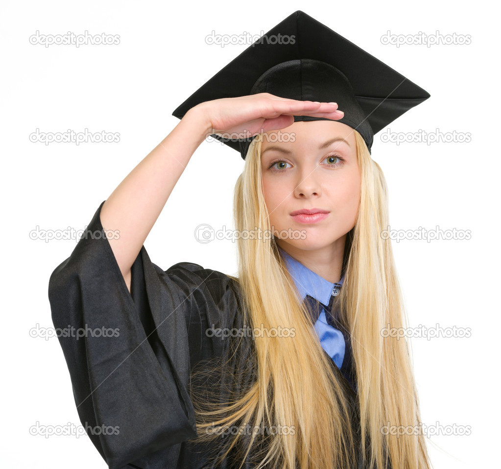 Young woman in graduation gown looking into distance Stock Photo by  ©CITAlliance 25393199