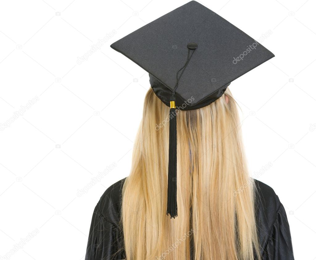 Woman in graduation gown . rear view