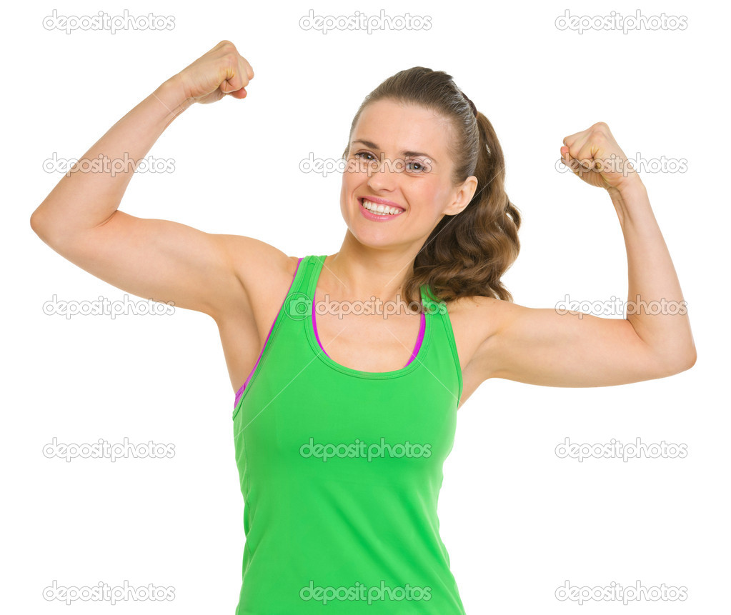 Happy fitness young woman showing biceps Stock Photo by ©CITAlliance  25399635