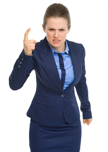 Angry business woman threatening with finger — Stock Photo, Image