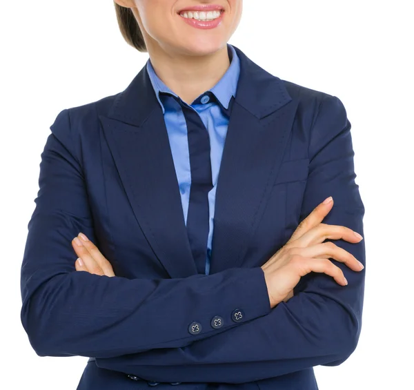 Closeup on happy business woman with crossed hands Stock Picture