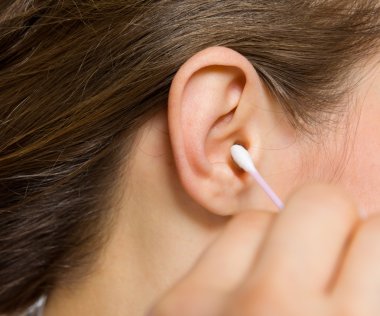 portre üzerinde pamuk bezlerden kadının elinde