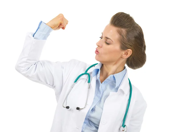 Doctor woman showing biceps — Stock Photo, Image