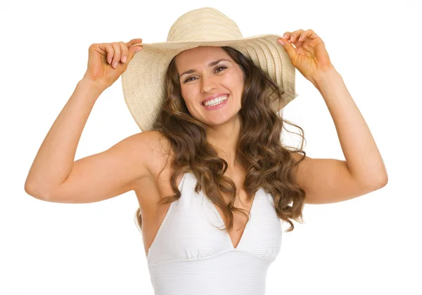 Portret van lachende jonge vrouw in badpak en hoed — Stockfoto