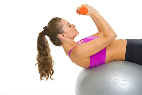 Fitness young woman making exercise with dumbbells — Stock Photo, Image