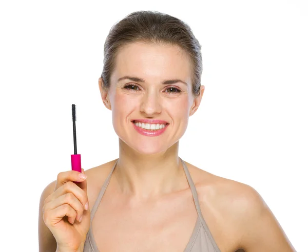 Beauty portrait of happy young woman holding mascara brush — Stock Photo, Image