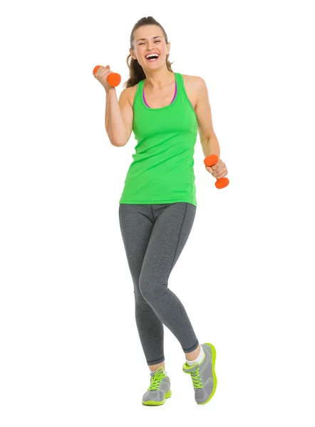 Tam uzunlukta dumbbells ile mutlu fitness genç kadının portresi — Stok fotoğraf