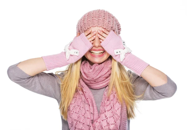 Happy teenager girl in winter hat and scarf closing eyes — Stock Photo, Image