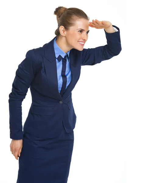 Happy business kvinna som tittar in i distansera — Stockfoto
