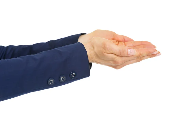 Closeup on hands of business woman presenting something on empty — Stock Photo, Image