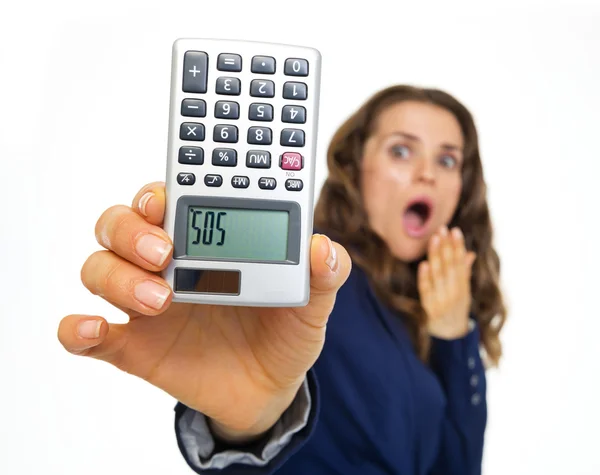 Afraid business woman showing calculator with sos inscription — Stock Photo, Image