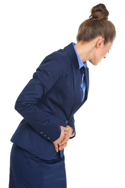 Mujer de negocios con dolor de estómago — Foto de Stock