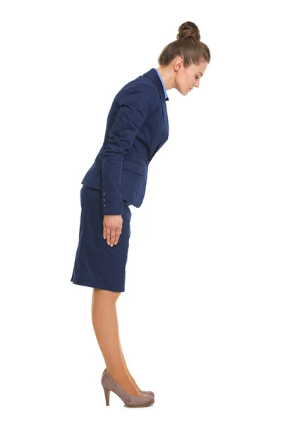 Full length portrait of business woman making asian greeting — Stock Photo, Image