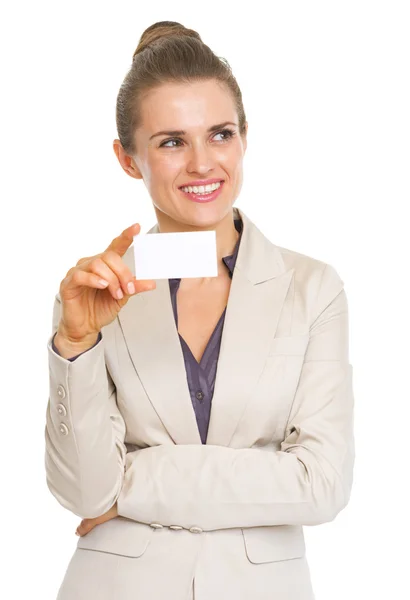 Thoughtful business woman holding business card Royalty Free Stock Photos