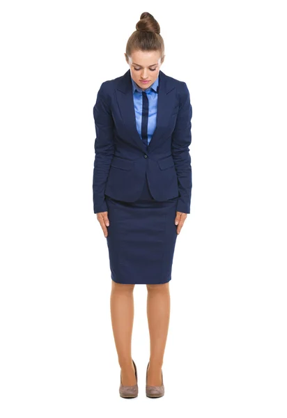Full length portrait of business woman making asian greeting Royalty Free Stock Images
