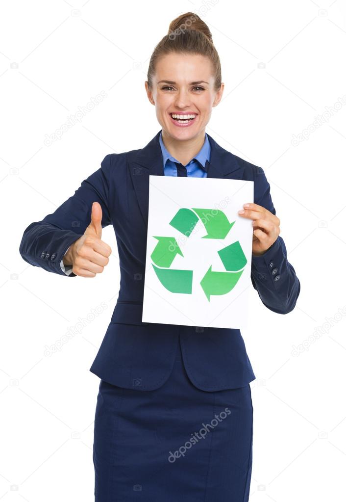 Happy business woman showing recycle sign and thumbs up
