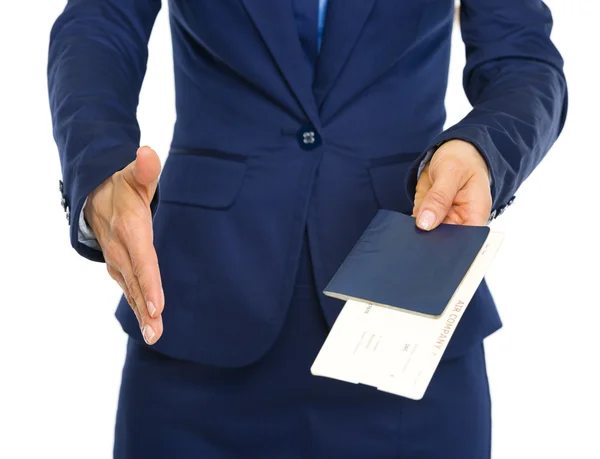 Closeup on business woman giving passport with air tickets and s — Stock Photo, Image