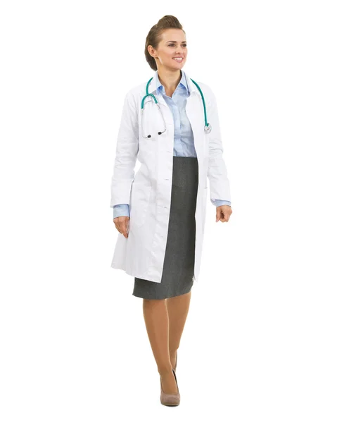 Smiling doctor woman going straight and looking on copy space — Stock Photo, Image