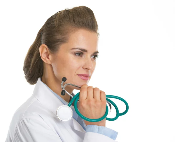 Portrait of thoughtful doctor woman with stethoscope — Stock Photo, Image