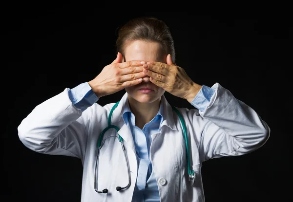 Portrait of doctor woman showing see no evil gesture isolated on — Stock Photo, Image